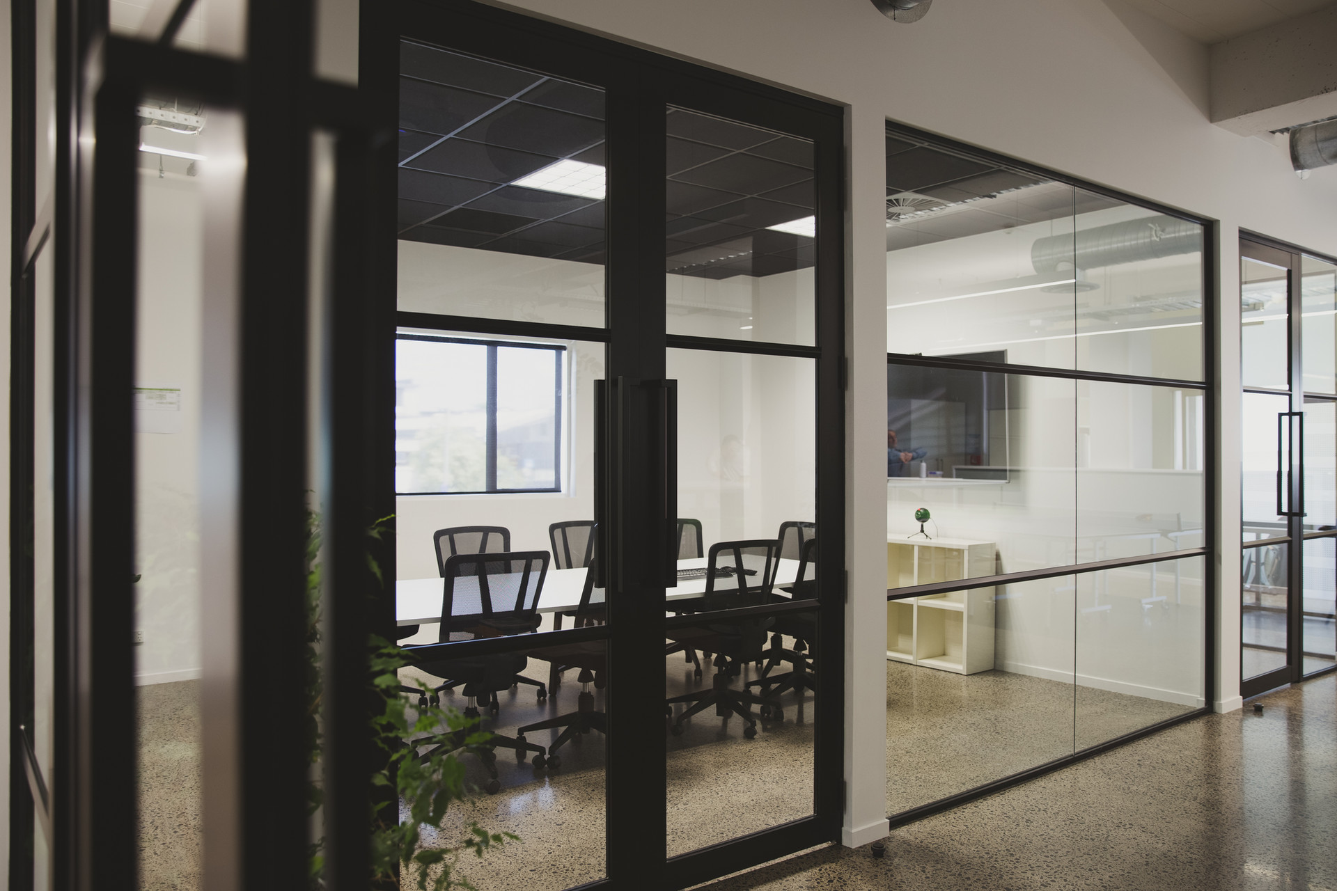 Commercial office fitout with modern glass partitions